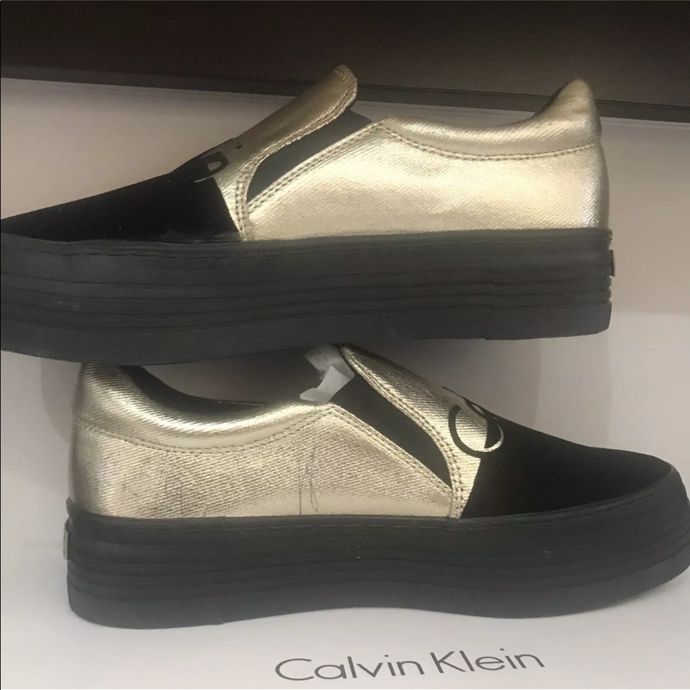 BNIB Calvin Klein high heel Sneaker Gold/Black sz7